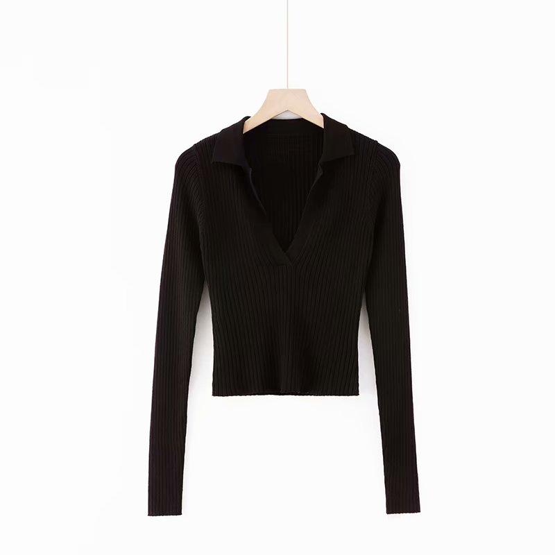 "Black Gothic Crop Top crafted from quality knit fabric with a deep V-neckline"