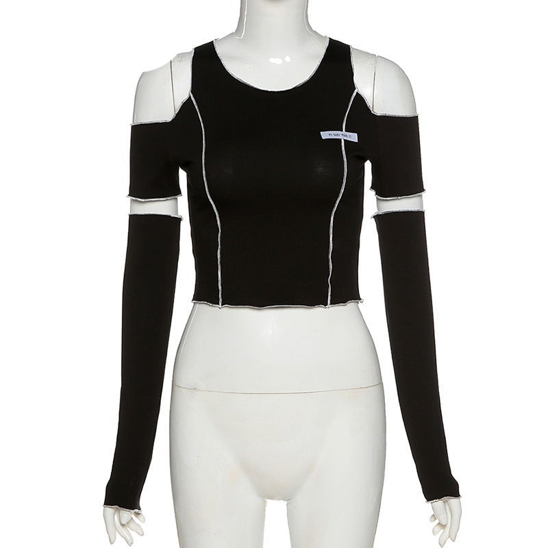 "Stand out from the crowd with this Gothic crop top, featuring a stunning patchwork design and alluring open shoulders."