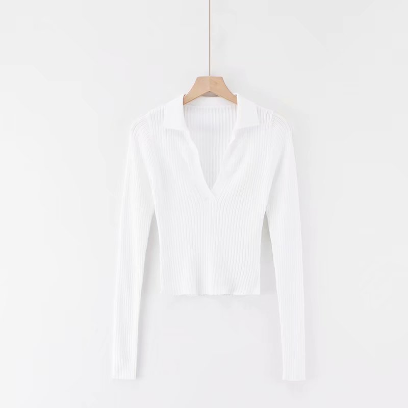 "Stylish and versatile Gothic Knit Crop Top with a deep V-neck for a bold and daring look"