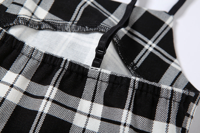Gothic-inspired Plaid Camisole Set - Unleash your inner goth with this striking two-piece set, showcasing a plaid camisole and matching skirt.