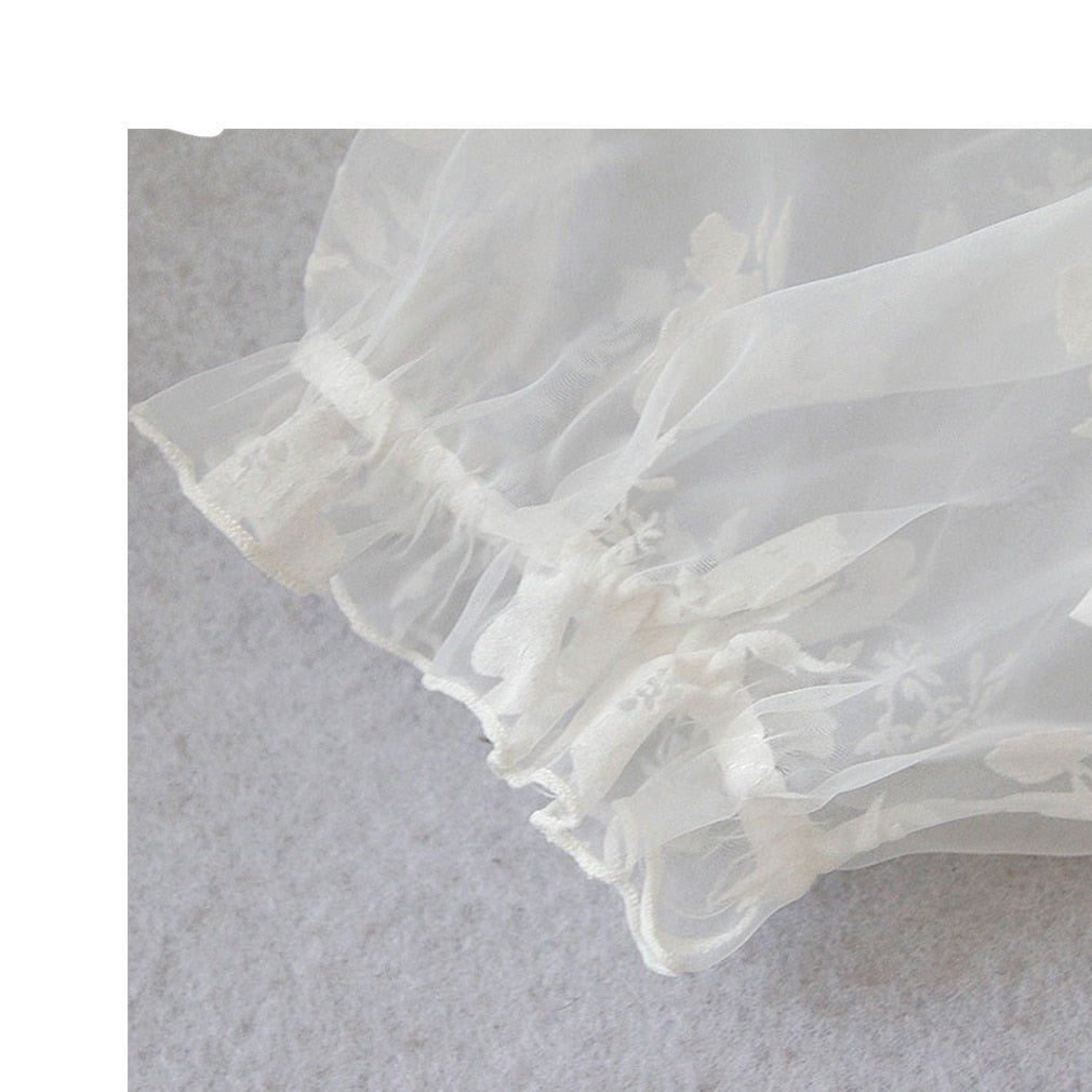 Dark and alluring lace crop top with an off-shoulder neckline"