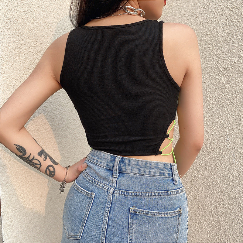 Grunge-inspired sleeveless crop top with punk attitude