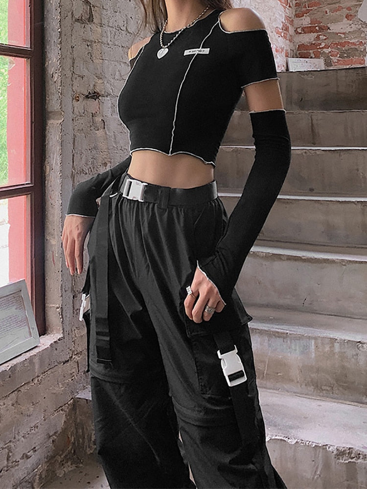 Bold and fashionable Gothic crop top with eye-catching patchwork and edgy open shoulder style."