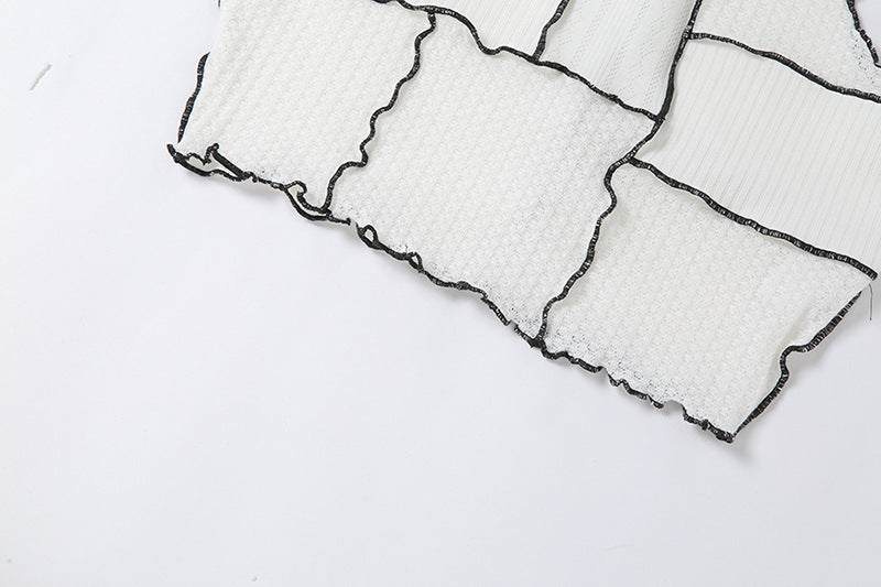 Punk-inspired sleeveless crop top for an edgy look