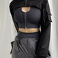 "Dark and sleek Gothic jacket featuring black faux leather and silver-tone accents