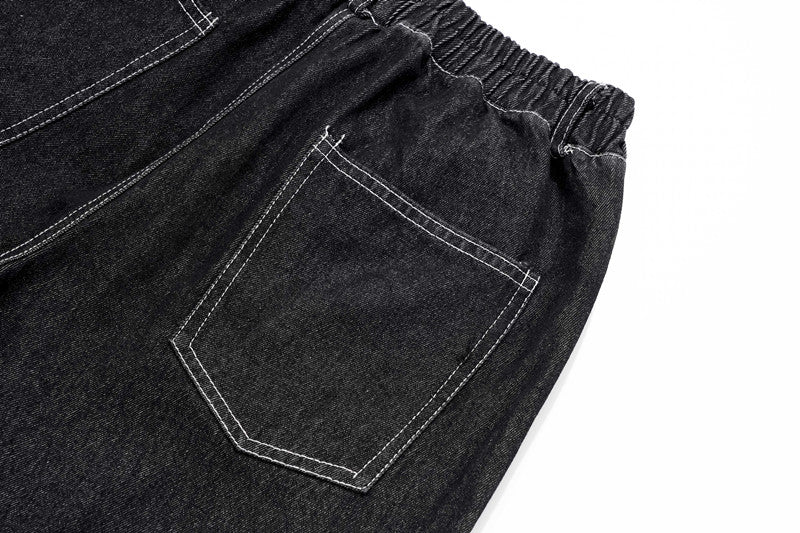 "Gothic Style Baggy Denim Jeans with Distinctive Design Elements"