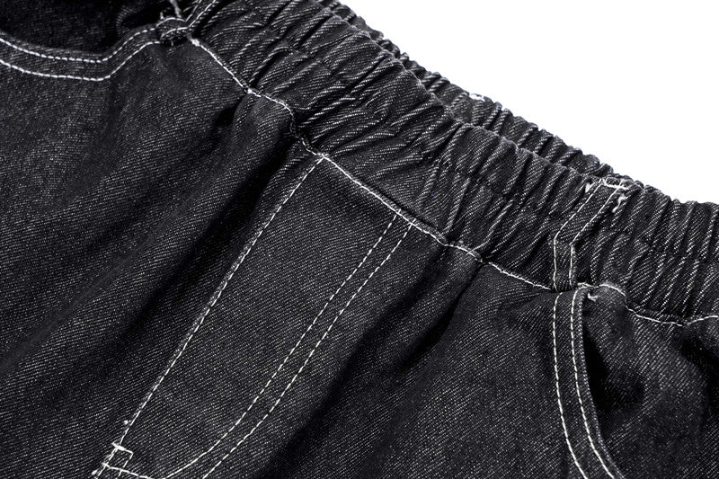 "Gothic Baggy Jeans with Unique Wash and Distressed Finish"