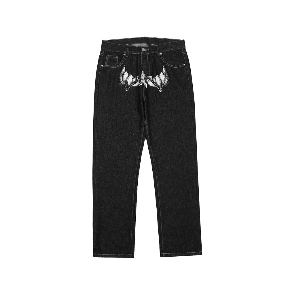Unique and stylish black denim jeans with gothic embroidery details.