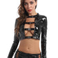 Shiny patent leather crop top with buckle accents in a punk-inspired design