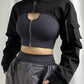 Edgy Gothic-style jacket with cropped length and unique design elements