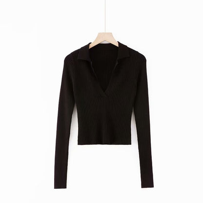 "Black Gothic Crop Top crafted from quality knit fabric with a deep V-neckline"