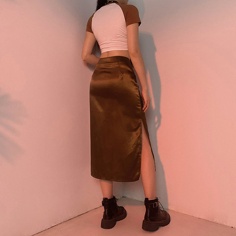 Stunning satin skirt featuring a high waist and flirty side slit