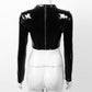 Sleek and stylish wet look crop top with buckles for a bold statement