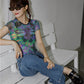 "Stand out from the crowd with this Gothic Dragonfly Crop Top, a perfect blend of style and attitude."