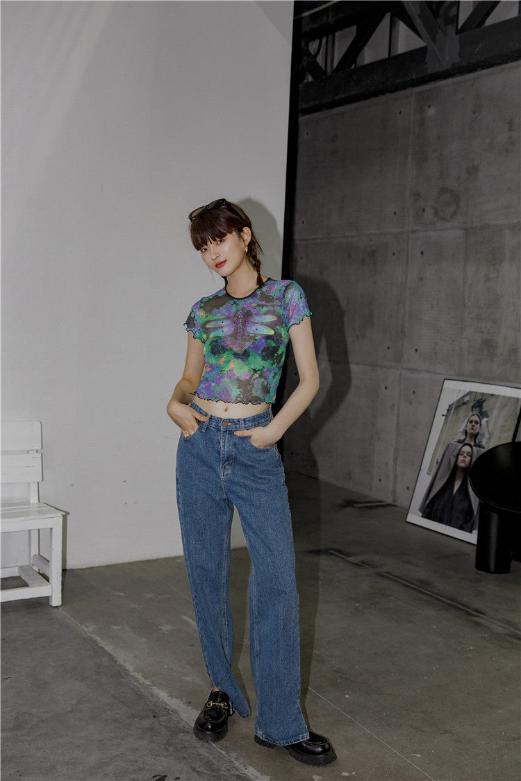 "Unique and fashion-forward, this Dragonfly Crop Top adds a touch of Gothic flair."