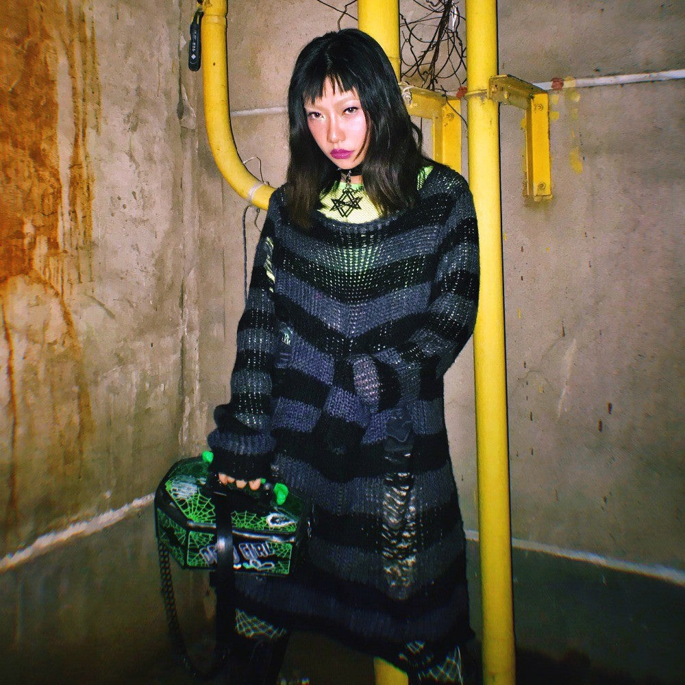 Add some edge to your wardrobe with this grunge-inspired striped jumper