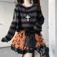 Alternative fashion jumper with grunge stripes and a unique aesthetic.