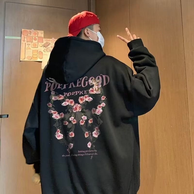 "Gothic Rose Graphic Hoodie with a mix of elegance and dark vibes"