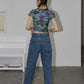 "Elevate your style with this eye-catching Gothic Dragonfly Crop Top."