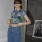 "Make a statement with this Gothic Dragonfly Crop Top, featuring a captivating design."