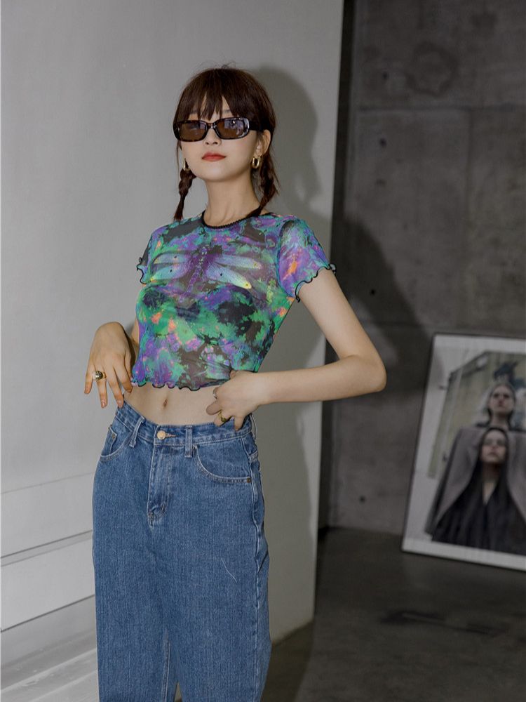 "Make a statement with this Gothic Dragonfly Crop Top, featuring a captivating design."