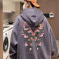 "Fashionable Hooded Sweatshirt with a bold rose design for a Gothic look"