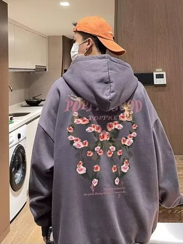 "Fashionable Hooded Sweatshirt with a bold rose design for a Gothic look"