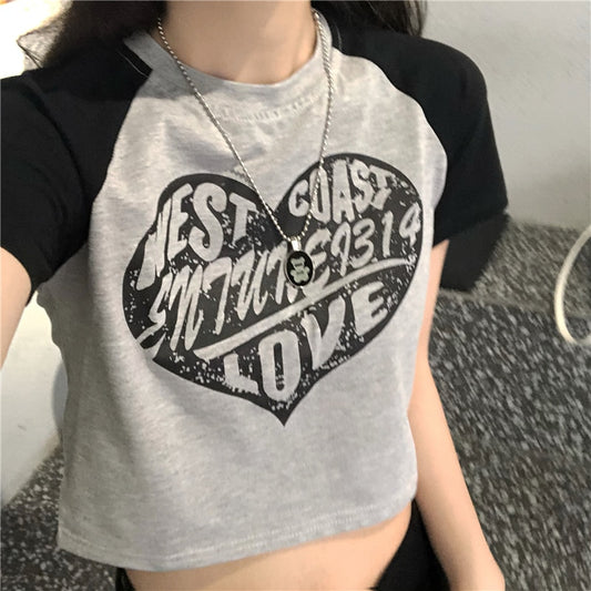 Women's black crop top t-shirt with grunge aesthetic print