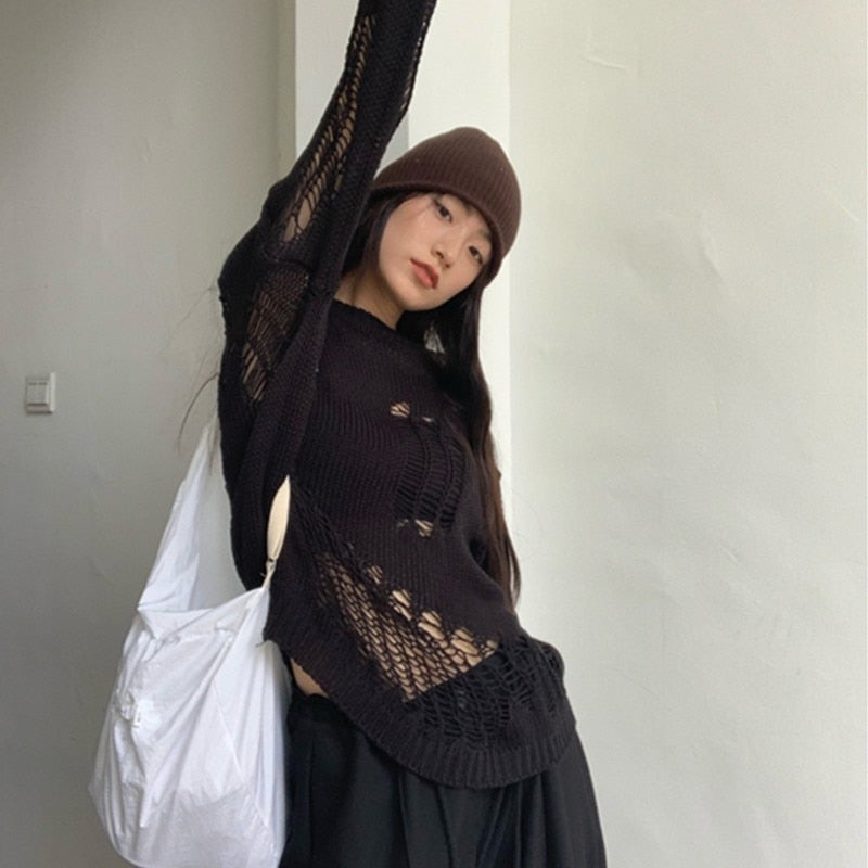 Fashionable Gothic Sweater for women with bold and intricate cut-out design