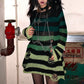 Add some edge to your wardrobe with this grunge-inspired striped jumper