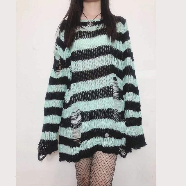 Embrace the dark aesthetic with this grunge striped jumper