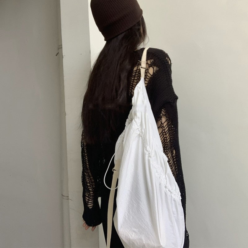 Intricately designed Gothic Sweater with ripped accents and distressed finish
