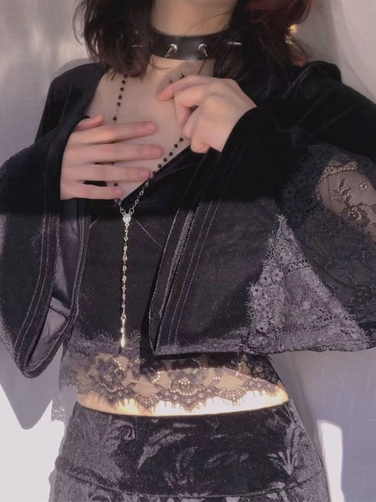 Gothic Lace Patchwork Flare Top: An edgy and stylish top with intricate lace patchwork and flared sleeves.