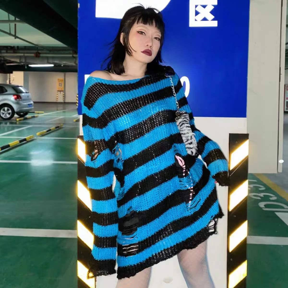 Alternative fashion striped jumper with dark aesthetic