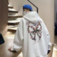 "Edgy and stylish Gothic Hooded Sweatshirt featuring a striking rose print"