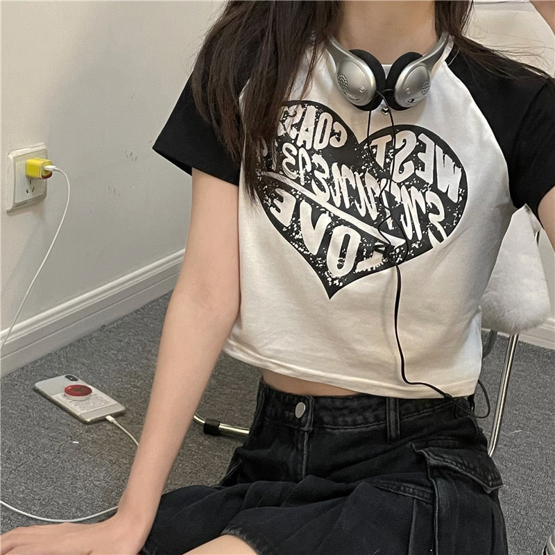 Black crop top t-shirt with unique grunge-inspired design for women