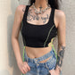Stylish sleeveless top with punk-inspired details