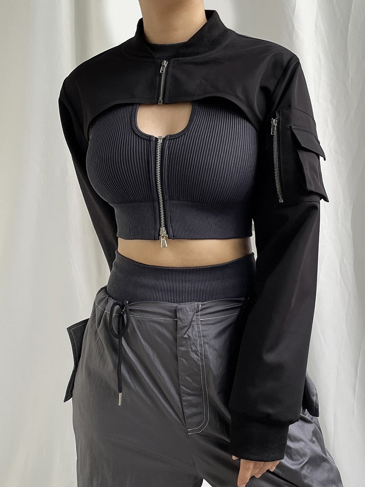 "Dark and sleek Gothic jacket featuring black faux leather and silver-tone accents