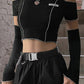 "Gothic patchwork crop top with open shoulders, perfect for a unique and edgy look."